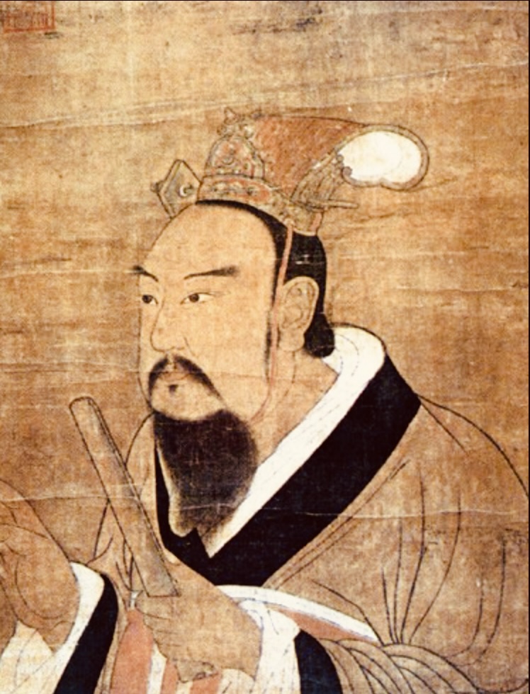 Ilustración antigua de Wang Mang, emperador de la dinastía Xin (9-23 d.C.), conocido por sus reformas radicales y las teorías que lo vinculan con viajes en el tiempo. La imagen muestra un retrato tradicional con vestimenta imperial y tocado distintivo.